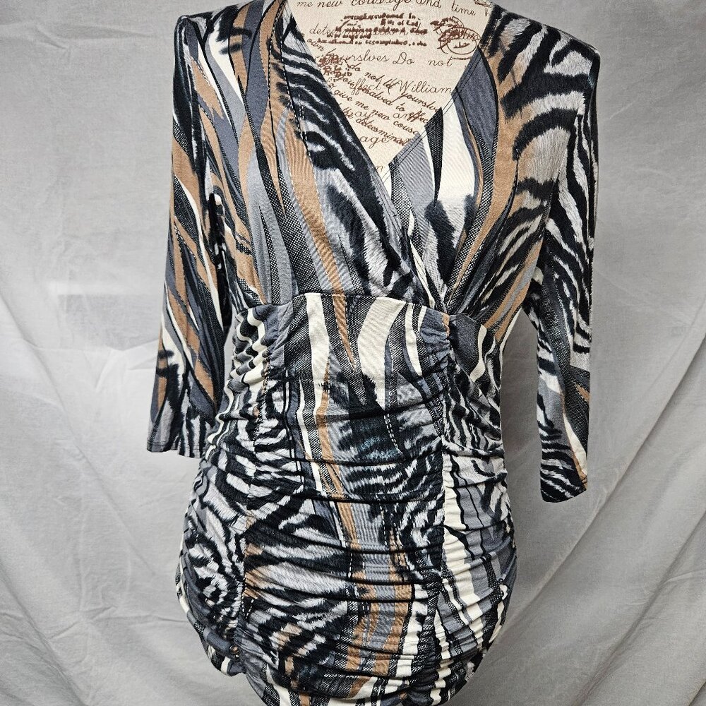 3/$25 Animal print wrap top